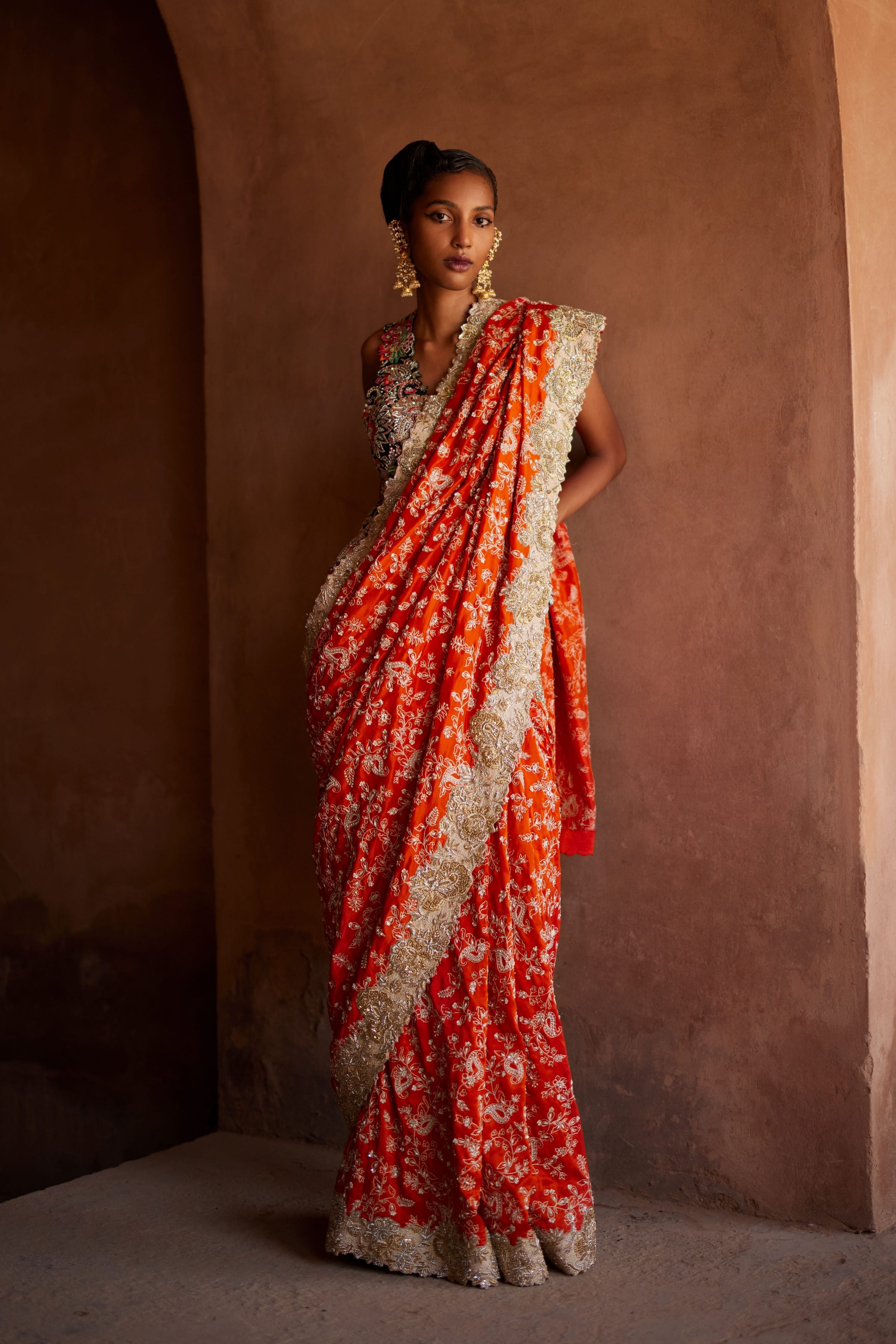 Kangana Ranaut looks like a regal queen in an orange Banarasi saree | Times  of India